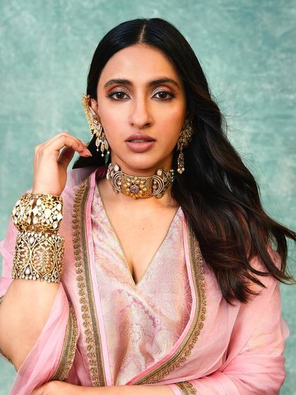 A close up on the stunning Amrapali jewelry styled for Akansha Ranjan Kapoor. The intricate choker and oversized ear cuff added a touch of royal grandeur to her look.