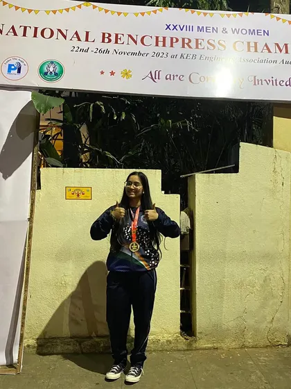 A victory photo of Priyanshi with her gold medal at the National Bench Press Championship. A great performance and a sign of more to come.