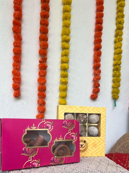 Sparkle and sweetness, all in one. Our Diwali combo boxes pair the fun of cracker-shaped cookies with the deliciousness of traditional ladoos, made just for dogs.