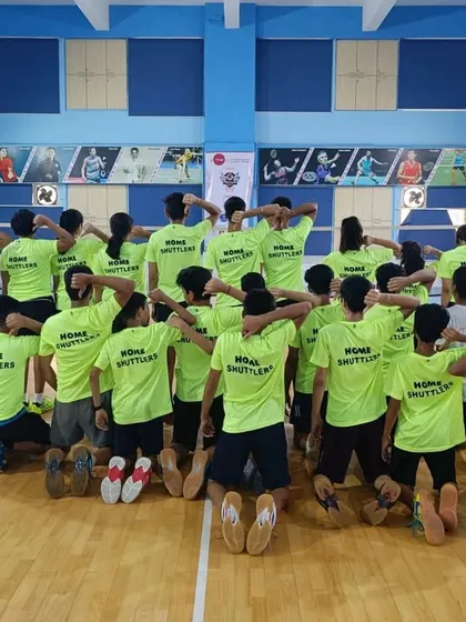 More than just a team, we are a tribe. Our players showing off their official Home Shuttlers camp t-shirts, a symbol of the unity and spirit we build on and off the court.