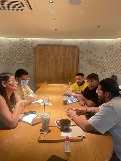 Collaboration is key. Here's our team in a deep-dive session, discussing strategy and new ideas to bring the best consulting services to our clients.