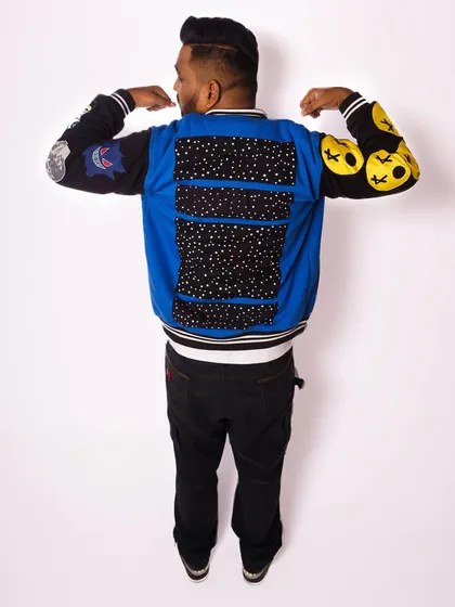 Showing off the back of the custom jacket. The details matter, both in my music and my style.