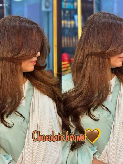 A beautiful chocolate brown color with face framing layers. This look is classic, elegant, and suits everyone.
