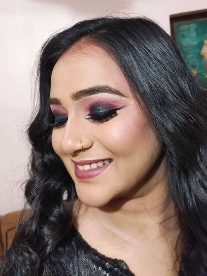 A happy client enjoying her new look.