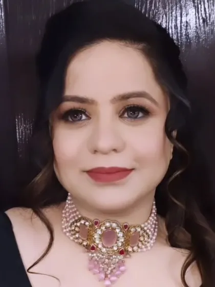 Another angle of this gorgeous party look, highlighting the glowing skin and perfectly blended makeup.