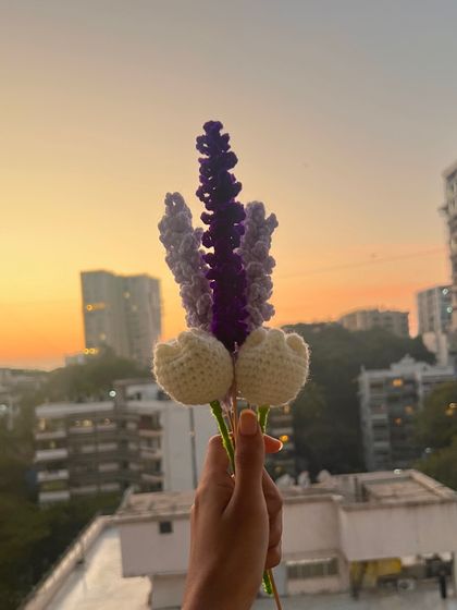 Here are some of my favorite forever flowers, a handful of white tulips and purple lavenders, held up against the sunset. You can pick your own flowers and colors to create a custom bouquet.