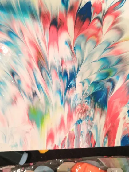 You might be surprised by what you can create. This vibrant abstract piece was made by a participant in one of my acrylic pouring workshops.