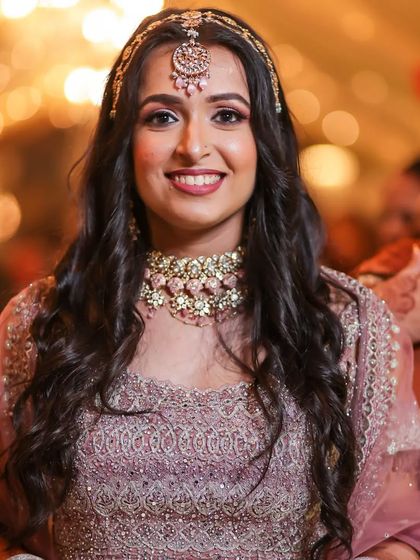 A beautiful portrait of my client Sakshi. The makeup was designed to look stunning in professional photos, with a focus on enhancing her smile and eyes.