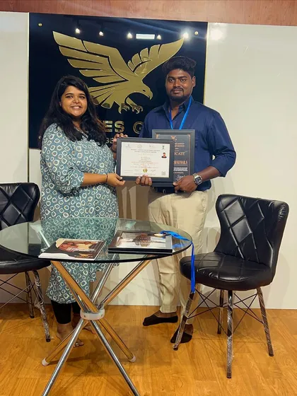 A student from Batch 06 proudly holding his certificates. He has successfully navigated the essentials of event planning, from concept to execution.