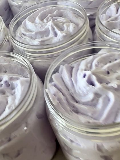 Jars of freshly piped Lavender Whipped Soap. The calming scent of lavender essential oil makes this the perfect addition to your nighttime relaxation ritual.