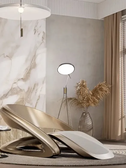 A render showing the chair in a minimalist interior with a marble wall. Its golden finish and sleek lines add a touch of glamour and sophistication.