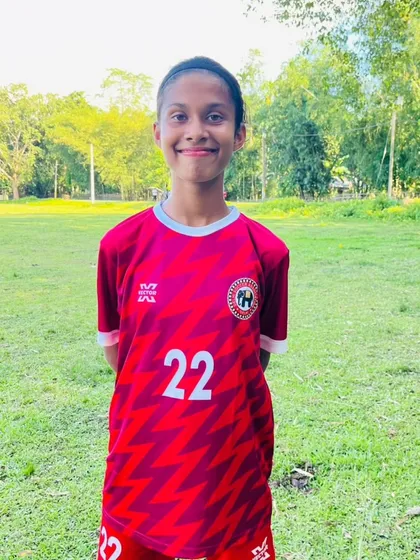A portrait of Prapti Das, selected for the Delhi State Sub-Junior girls squad. Her focus and determination are clear to see.