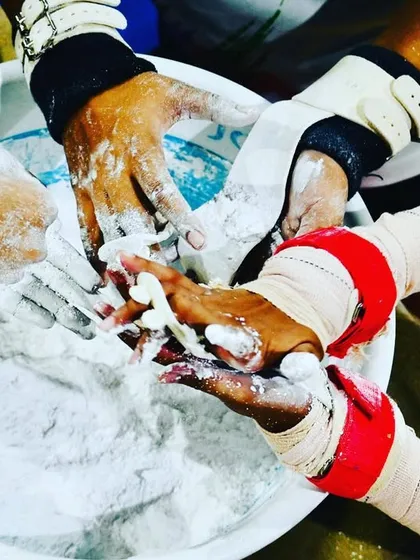 The chalk on our hands is a symbol of the hard work, dedication, and grip required to succeed. It's a ritual that prepares our gymnasts for the challenges ahead, one routine at a time.