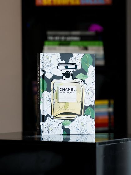 'Chanel in 55 Objects.' Elegance captured in pages, this book is a tribute to timeless style, fragrance, and the enduring legacy of a fashion icon.