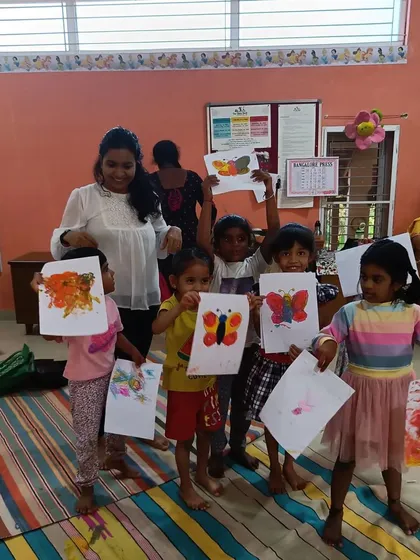 A beautiful mess of creativity. After a story about the life cycle of a butterfly, the children made their own colorful butterfly paintings using a fun, hands-on technique.