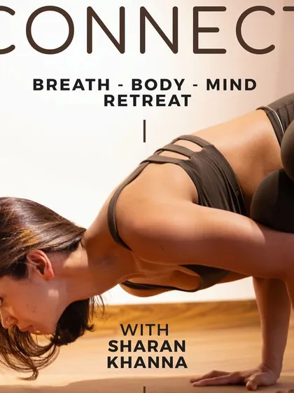 A close-up of my practice in Bakasana (Crow Pose), featured on a retreat poster. This pose is a great starting point for anyone wanting to explore arm balances.