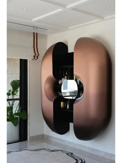 The bar unit open, revealing its functional interior. The sliding mechanism is seamless, and the internal storage is strategically crafted for maximum utility.