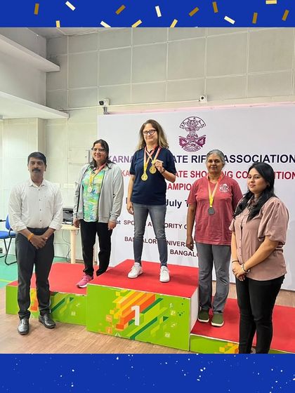 Our coach Manika on the top of the podium, one of her two gold medals from the 12th Karnataka State Shooting Championship.