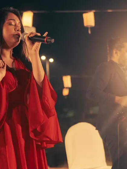There's nothing like the magic of a wedding. Dressed in red and singing my heart out for a beautiful couple's special day. We curate soulful and energetic wedding music setlists that create memories for a lifetime.