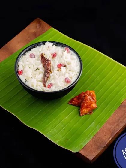 The perfect end to any South Indian meal is a bowl of cool and creamy Curd Rice. I prepare it with a simple tempering and garnish it with pomegranate seeds.