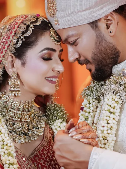 It's the quiet moments of connection that tell the loudest love stories. I focus on capturing the genuine smiles and gentle touches that you'll cherish forever, like this beautiful close-up portrait.