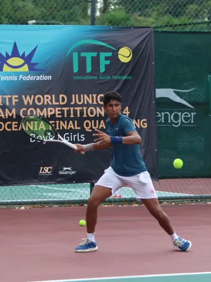 Tavish Pahwa preparing to hit a backhand during the ITF World Junior Team Competition. His solid stance and preparation are fundamentals we drill daily.
