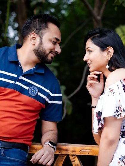 A casual and sweet pre-wedding moment. The makeup is natural and fresh, perfect for a relaxed outdoor shoot.