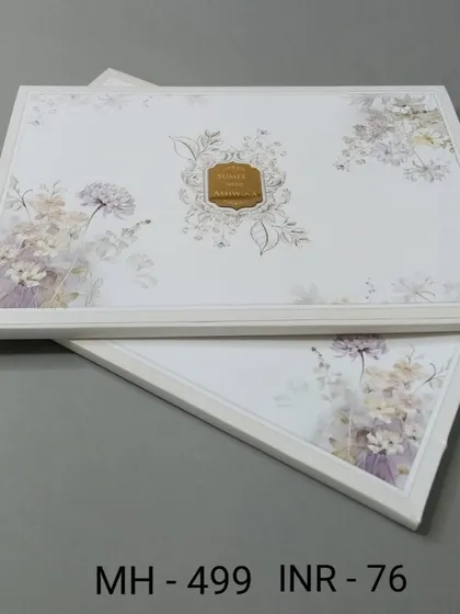 This framed invitation features a delicate lavender floral print on a white background. The design is light, airy, and perfect for a modern spring wedding.