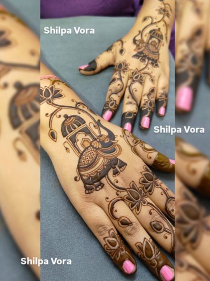 This modern traditional design features a majestic elephant in a 'jharokha' (window), with lotus vines flowing down the fingers.