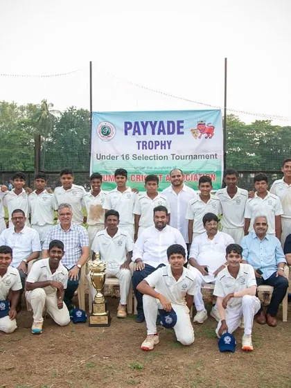 The victorious team and finalists of the U-16 Payyade Trophy pose for a group photograph with coaches and officials, celebrating their success in this important MCA selection event.