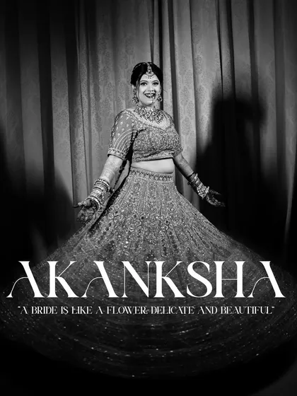 A beautiful black and white bridal portrait where the bride is joyfully twirling in her lehenga. The text overlay adds a touch of elegance, making it feel like a magazine feature.
