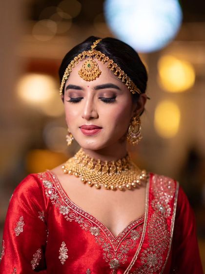 A close-up with eyes closed to showcase the blended eyeshadow and the clean, defined brows.