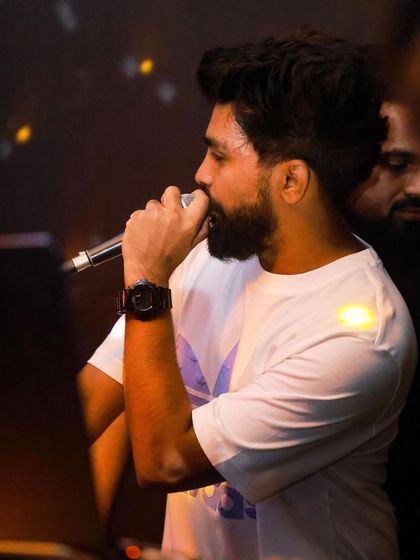 Creating musical magic on the decks. This close-up shot captures the focus and passion that goes into every set I play.