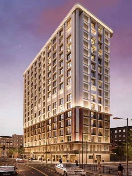 An evening render of a residential tower for Platinum Corp in Mumbai. The lighting design is crucial, highlighting the building's form and creating a warm, inviting presence in the urban skyline.