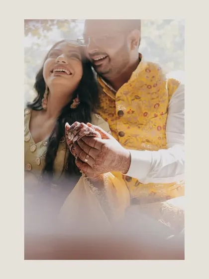 A candid, joyful moment between Tushar and Samta, filled with laughter. This image perfectly captures the lighthearted and happy spirit of their pre-wedding festivities.