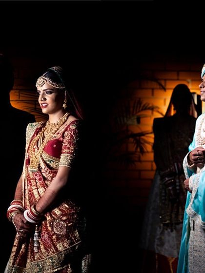 An artistic portrait of a bride and groom using shadows and light to create a dramatic and memorable image.