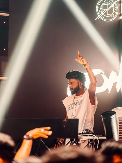 Another shot from my set at FLO, pointing to the sky as the beat builds.