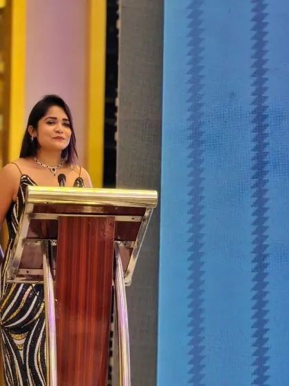 Confidently standing at the podium, representing the RP Group. I bring a sense of stability and professionalism to your corporate events.