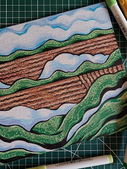 The full view of the canvas painting, surrounded by the markers I used to create it.