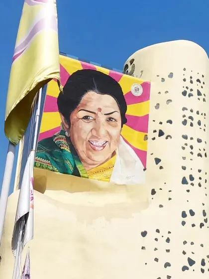 A colorful portrait of the late Lata Mangeshkar, the "Nightingale of India," displayed on the Mumbai Art Society building in Bandra. A fitting tribute to a voice that is synonymous with the nation's culture.