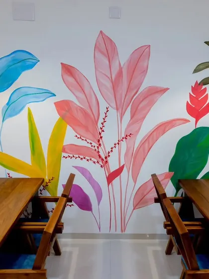 A vibrant tropical mural painted in the Board Games Hub, designed to create a fresh and energetic atmosphere.