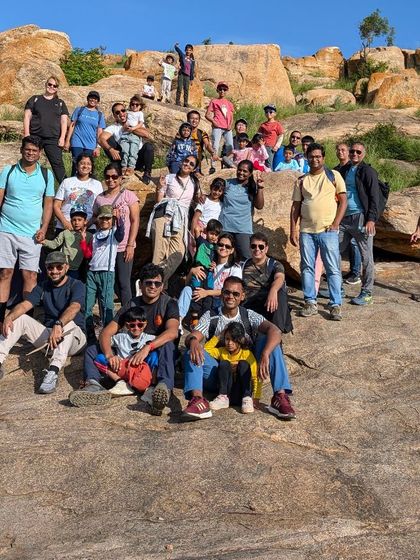 A happy group of our Tiny Trekkers taking a well-deserved break on the rocks. These treks are as much about community and making new friends as they are about reaching the summit.