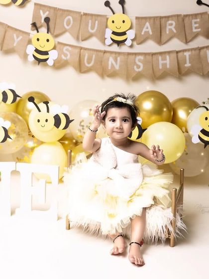 A honey bee theme for a honeybun. This "You Are My Sunshine" first birthday shoot is full of joy and sweetness.
