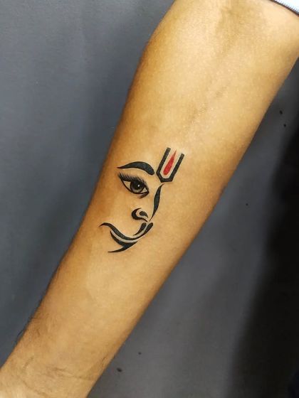A minimalist depiction of Lord Hanuman's face. This design is a great example of how we can represent a powerful deity with just a few elegant lines.