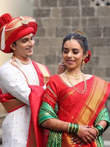 A classic Maharashtrian groom look for a wedding ceremony. I styled the traditional red Pheta and ensured his makeup was flawless yet understated, perfectly complementing the bride's divine look for their special day.