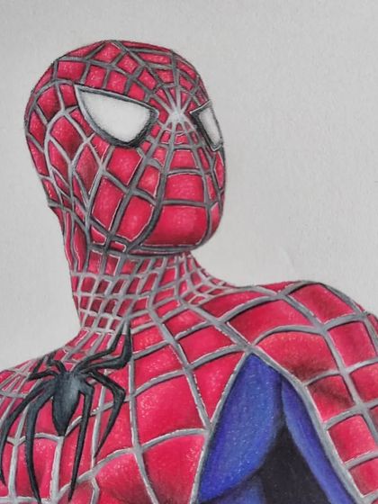 A view of Spider-Man's head and shoulders, showing the shine on the mask's eyes and the intricate webbing detail.