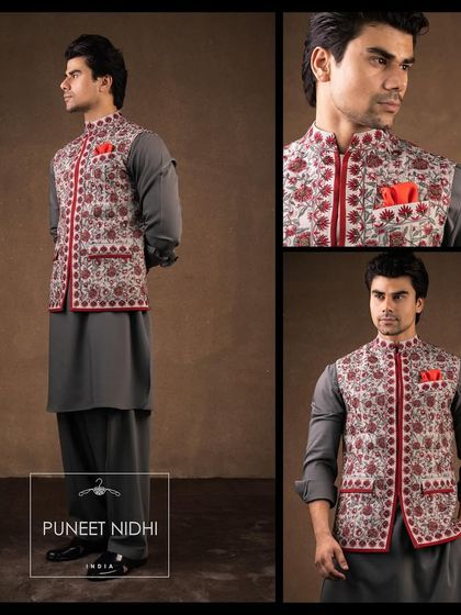 A multi-colored threadwork jacket clubbed with a grey pathani suit, perfect for a sufi sangeet event. The vibrant embroidery stands out against the subtle grey.