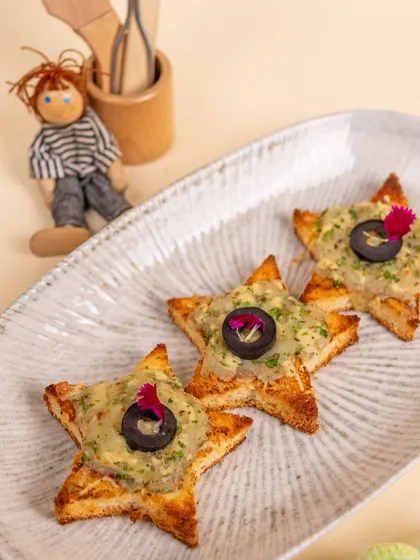 Star-shaped toasts with a creamy topping. We love making our food visually appealing to encourage even the fussiest eaters to try something new.