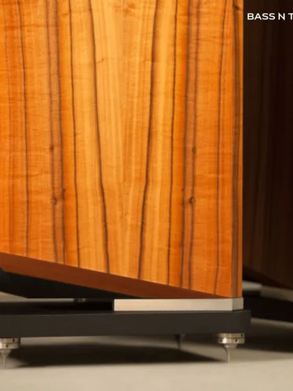 The intricate woodwork and solid plinth of the Kudos Titan 707. Every element is designed to manage resonance and deliver the purest possible sound.