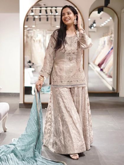 Beautifully textured, exquisitely designed, for a refined style. This cream sharara set is timeless.